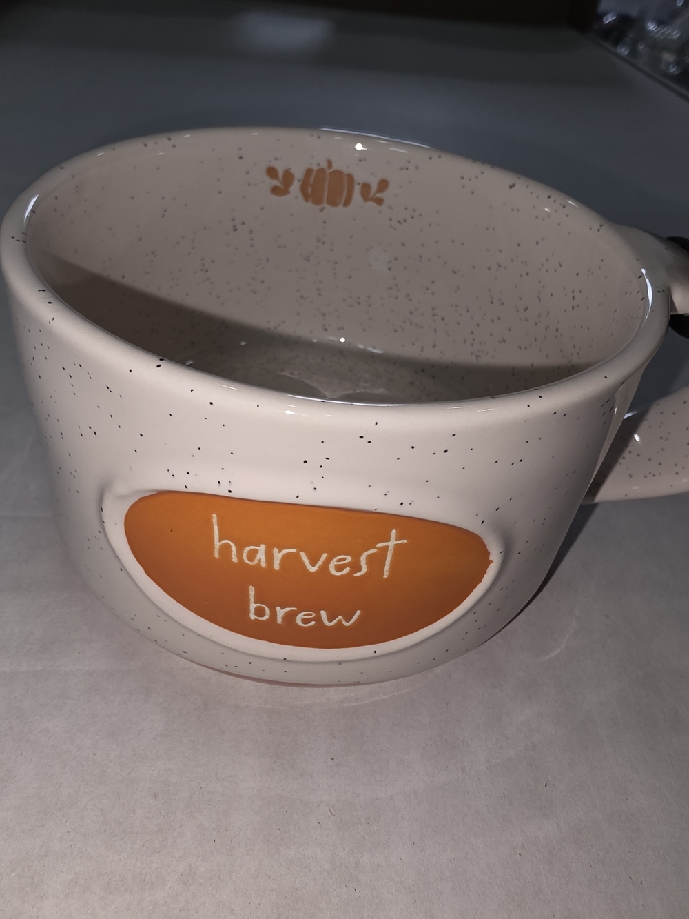 Rae Dunn Speckled Cream Mug with Orange 'harvest brew' Accent
